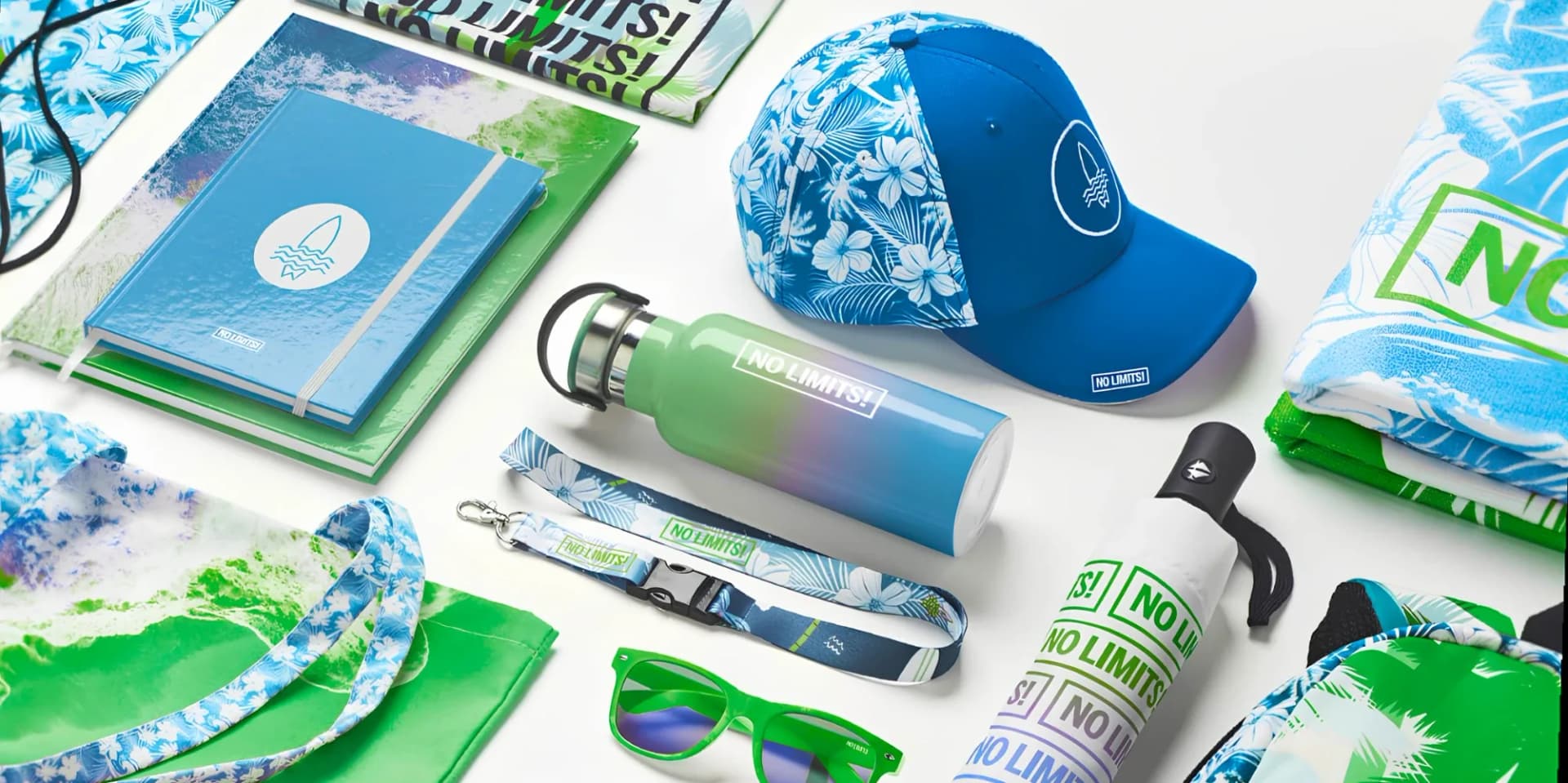 Logo-branded corporate gift kit: notebooks, water bottle, cap, lanyard, umbrella, tote bags, towel and sunglasses